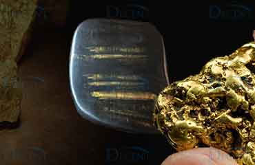 How did ancient people test the purity of gold? They used a touchstone