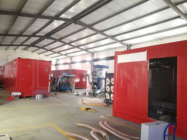 three container laboratories are installing dust collection system