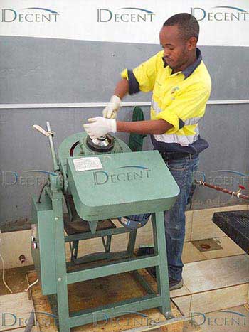 Tanzania Sample Preparation Laboratory worker operated machine Tanzania Sample Preparation Laboratory worker operated machine