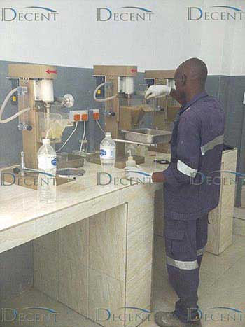 Tanzania Sample Preparation Laboratory worker float testing