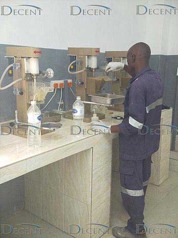 Tanzania Sample Preparation Laboratory worker float testing Tanzania Sample Preparation Laboratory worker float testing