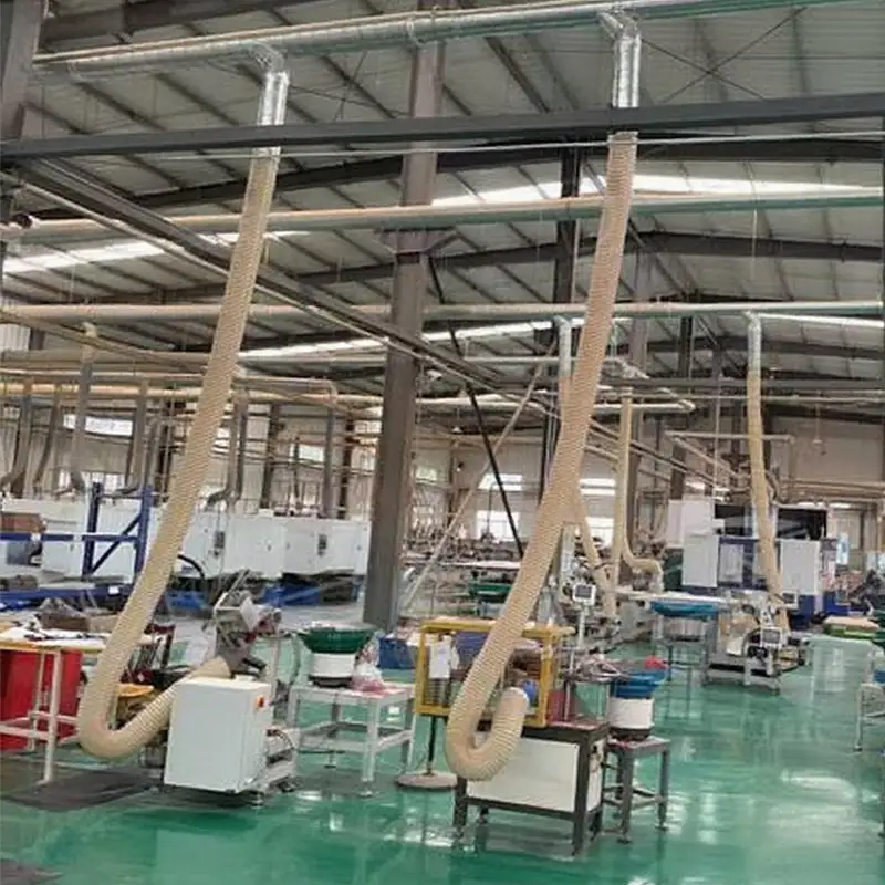 Factory Dedusting System Success Story in 2020 3 Close-up of DECENT external factory dedusting system ductwork and blue collection unit by Qingdao Decent Group