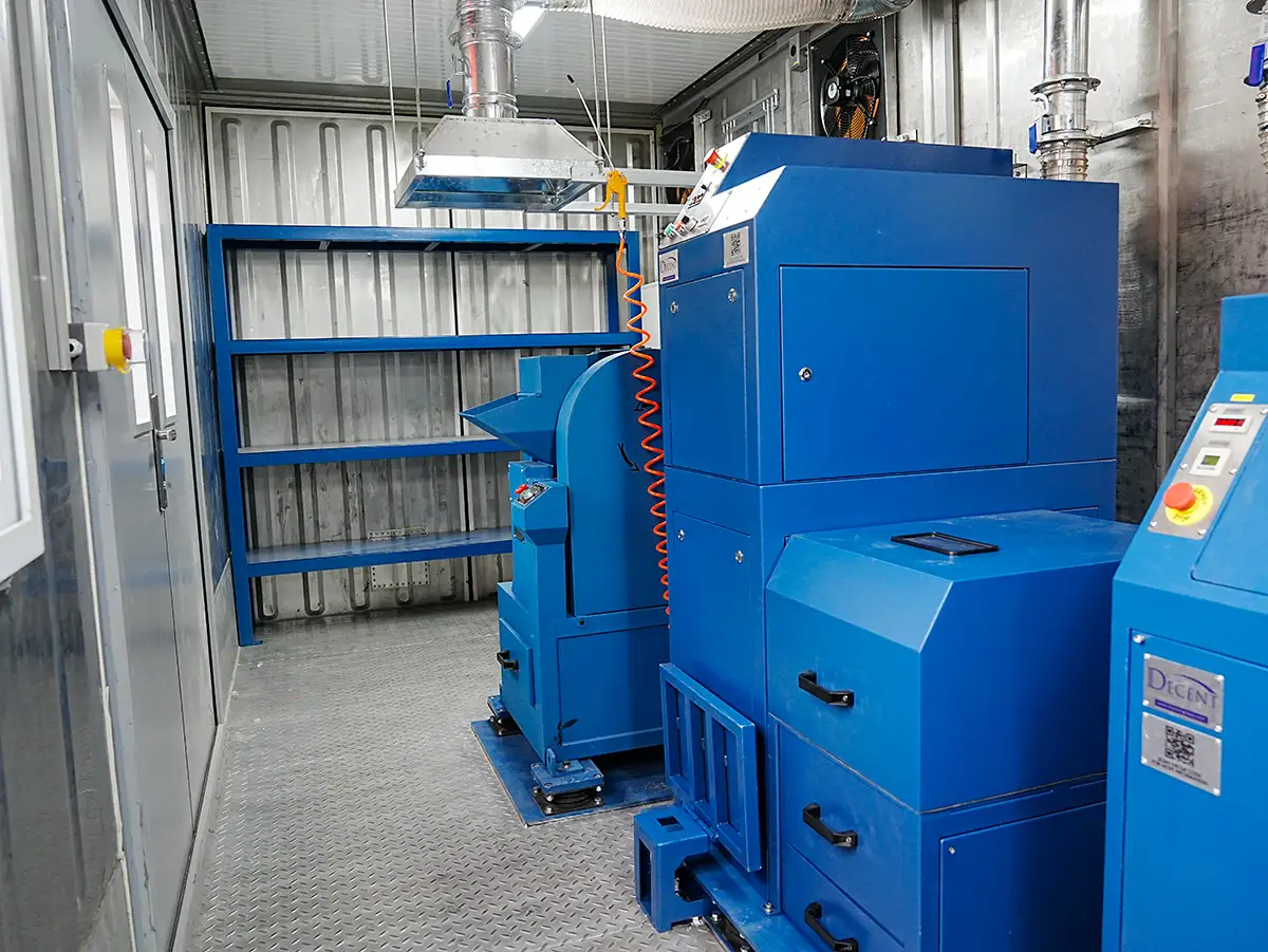 2025 Container Laboratory Triumph: DECENT Mexican Project Sets New Global Benchmark 2 DECENT sample preparation laboratory interior with blue industrial machinery, Qingdao Decent Group, mining and metallurgy equipment.