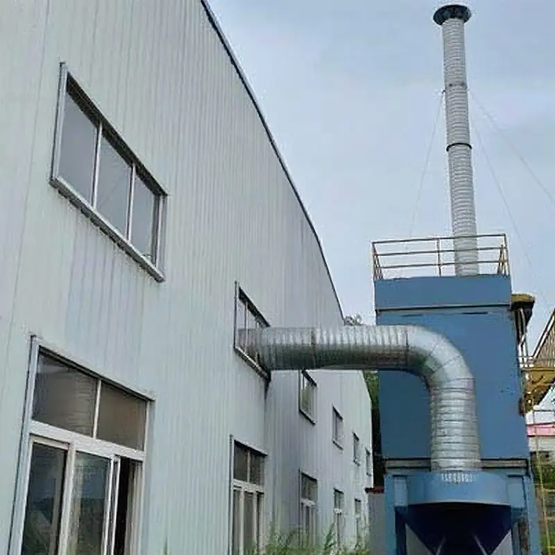 Factory Dedusting System Success Story in 2020 4 External factory dedusting system by Qingdao Decent Group, with blue unit and large duct connected to a building