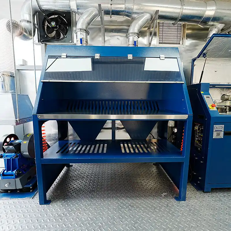 A blue DECENT sample preparation workbench with an overhead ventilation system inside a containerized laboratory in Djibouti.