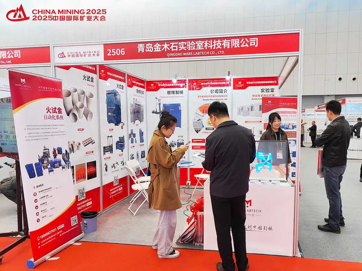 Strategic Minerals Testing: Qingdao Decent Group 's Breakthroughs Power the Global Energy Transition in 2025 6 Visitors and representatives interacting at the Qingdao Decent Group booth during the 2025 China Mining Conference and Exhibition.