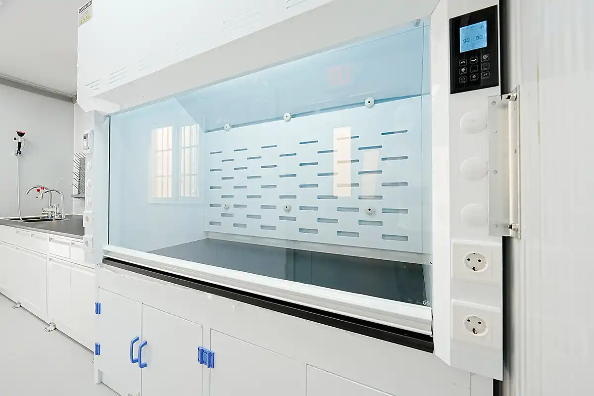 A white chemical fume hood from DECENT with a large glass window and a digital control panel in a clean laboratory setting.
