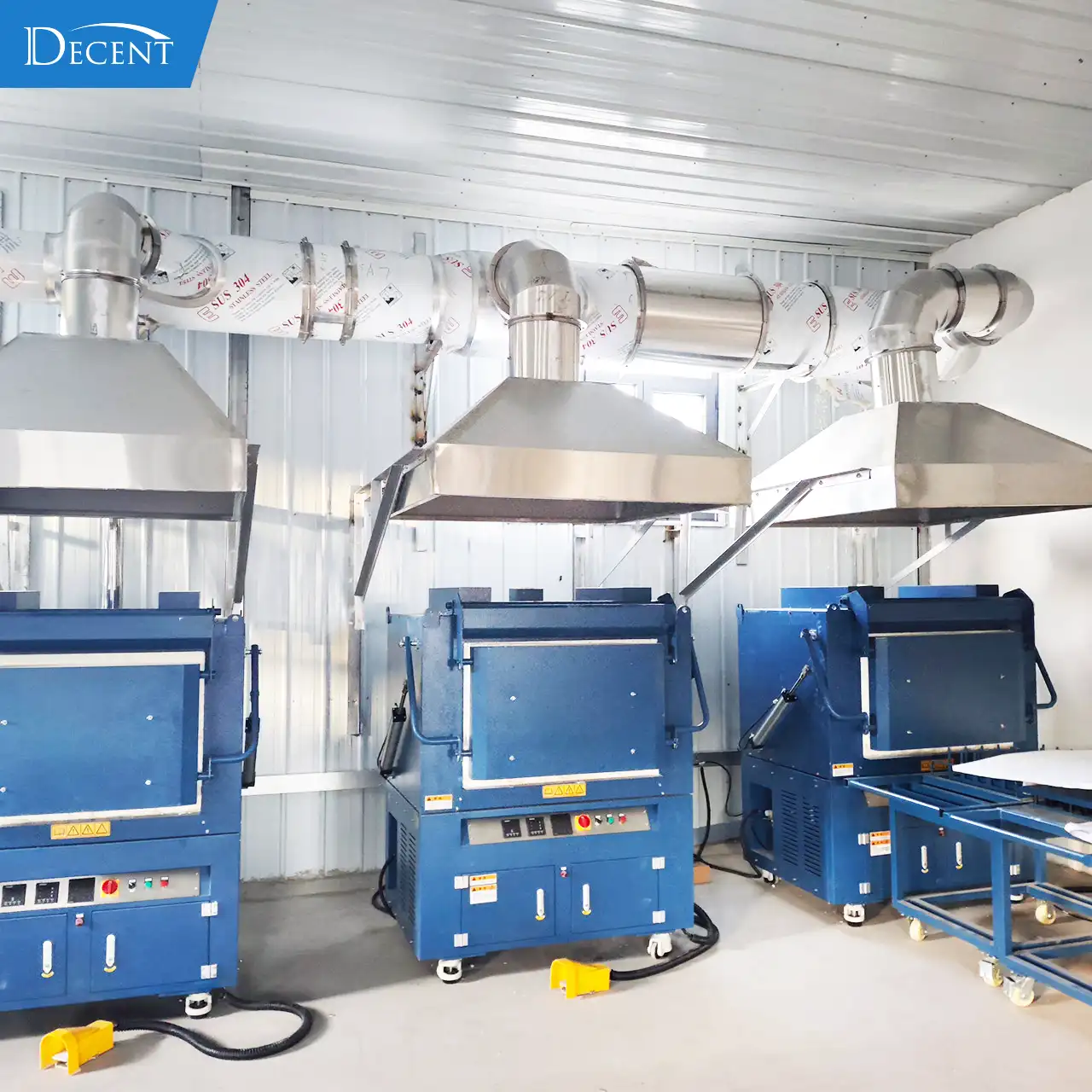 Three fire assay fusion furnaces with full exhaust ventilation system, installed by Qingdao Decent Group for Qinghai mining lab in extreme cold prefabricated house.