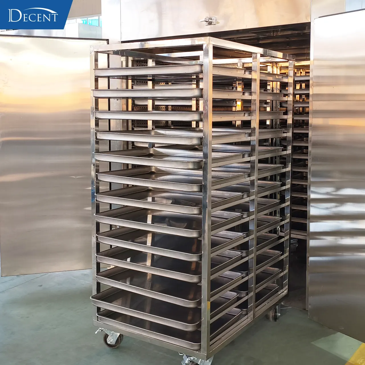 Achieve Energy Independence with a Fuel-Flexible Lab Drying Oven 1 DECENT stainless steel trolley system – high-capacity, ergonomic mineral sample drying with up to 26 shelves and 10kg per shelf.