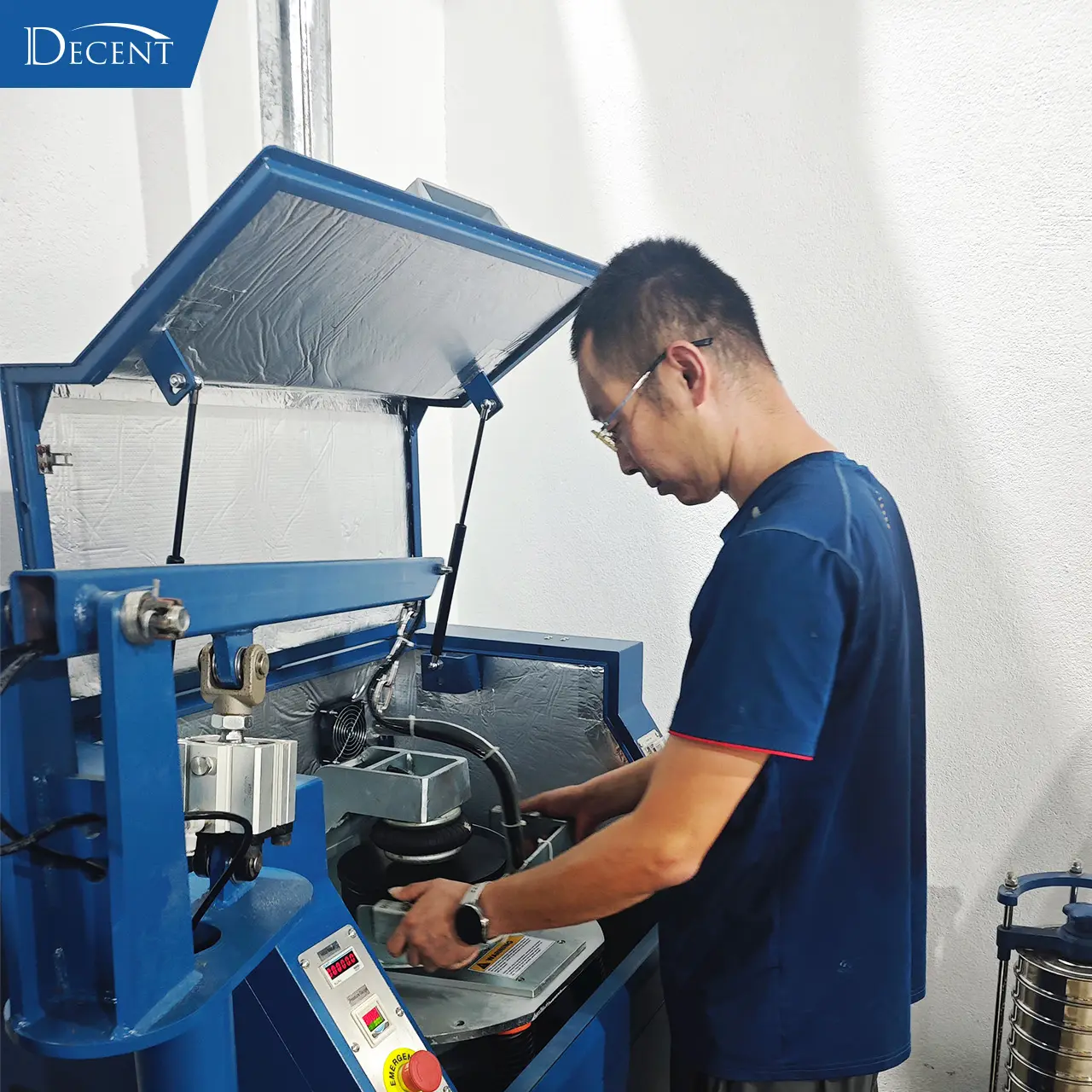 Qingdao Decent Group technical team provides on‑site lab pulverizer mill operational training within Laos fire‑assay lab for turnkey mineral laboratory construction